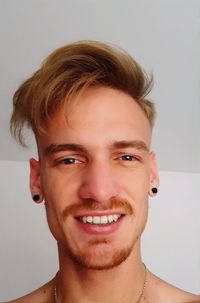 Portrait of young man smiling