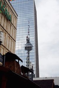 Low angle view of modern building against sky