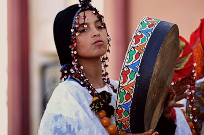 Portrait of young woman looking away