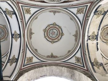 Low angle view of ornate ceiling of building