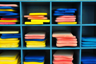 Full frame shot of shelves with colorful objects