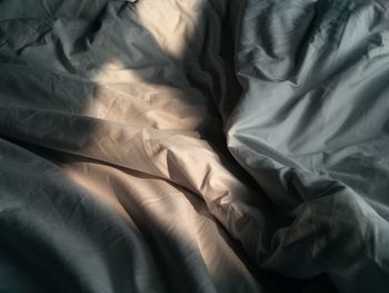 Full frame shot of sheet on bed at home