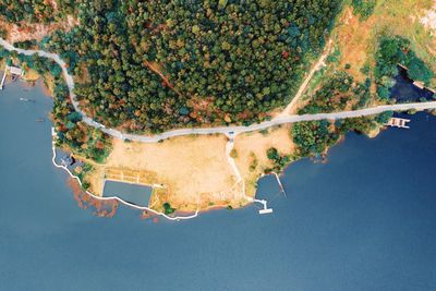 Aerial view of sea by landscape