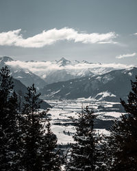 Scenic view of snowcapped mountains against sky