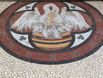 High angle view of multi colored pattern on tiled floor