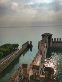 High angle view of historical building against cloudy sky