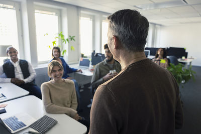 Group of business people having meeting in office