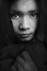 Close-up portrait of young woman