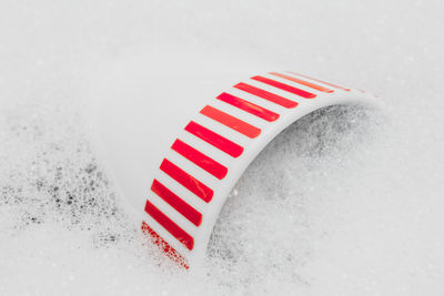 Close-up of snow over white background