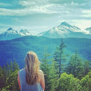 Woman looking at view of mountains