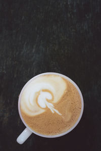 Directly above shot of cappuccino on table