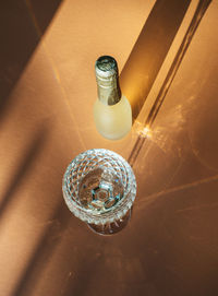 High angle view of illuminated lamp on table