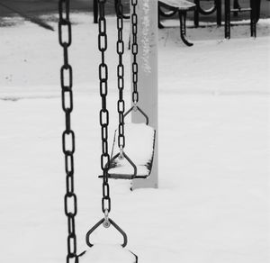 Close-up of swing in snow