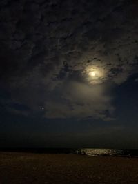 Scenic view of sea against sky at night