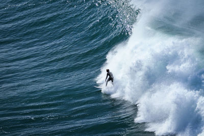 Man surfing in sea