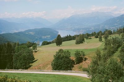 Scenic view of landscape and mountains against sky