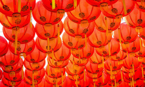 Low angle view of lanterns hanging in row