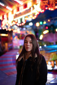 Portrait of beautiful woman at night