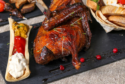 Close-up of roasted meat on barbecue grill