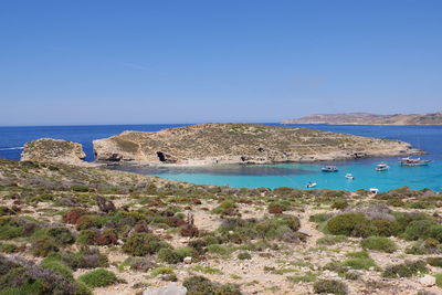 View of beach against blue sky