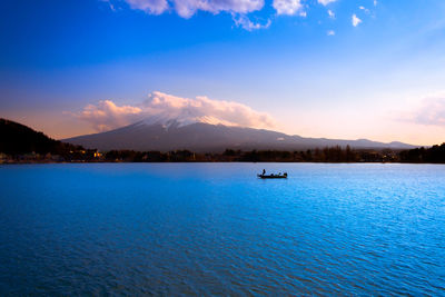 Scenic view of lake during sunset