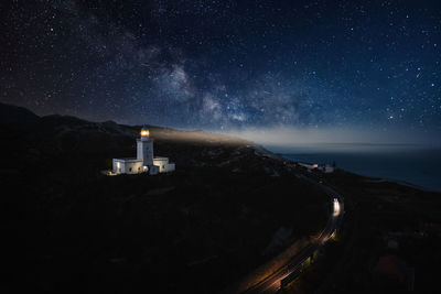 Lighthouse by night. aerial view