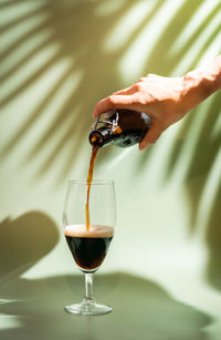 Close-up of wineglass on glass