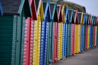 Close-up of multi colored beach huts