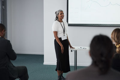 Woman having presentation during business meeting