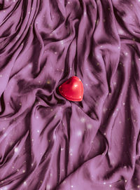 Full frame shot of purple rose with water drops