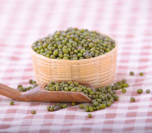 Close-up of green fruits on table