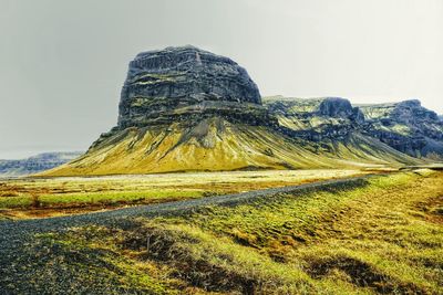 Scenic view of land against sky
