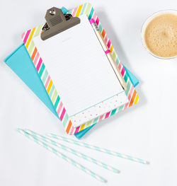 High angle view of coffee cups on table