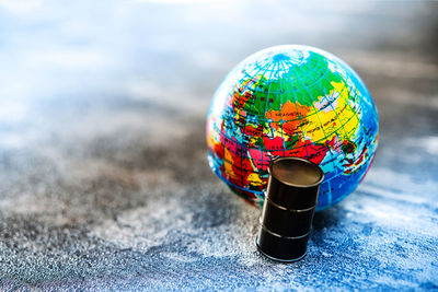 Close-up of miniature globe on table