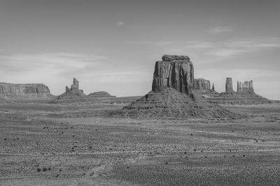 Black and white landscape of monoliths in monument valley