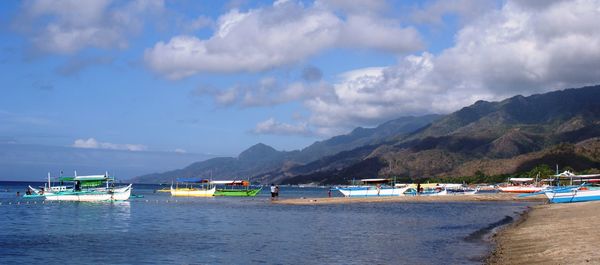 Scenic view of sea against cloudy sky