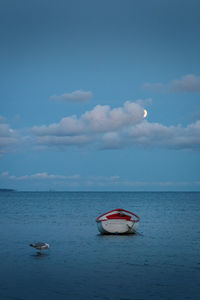 Boat in sea against sky