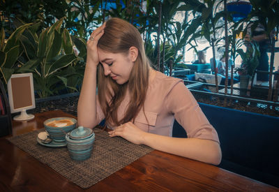 Young woman at cafe