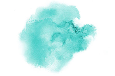 Close-up of blue water against white background