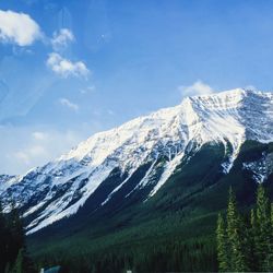 Scenic view of snowcapped mountain against sky