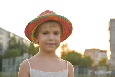 Portrait of cute girl wearing hat