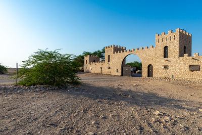 View of old ruins against clear sky
