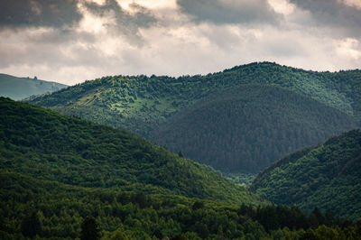 Scenic view of mountains against sky during sunset