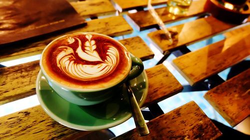 Close-up of cappuccino on table