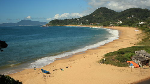 View of calm beach against the sky