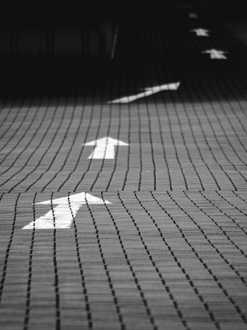 shadow, high angle view, sunlight, pattern, street, empty, focus on shadow, cobblestone, sidewalk, flooring, tiled floor, paving stone, day, footpath, outdoors, absence, textured, in a row