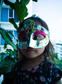 Close-up of girl wearing mask