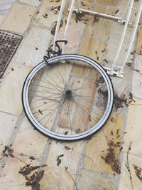 High angle view of old bicycle wheel