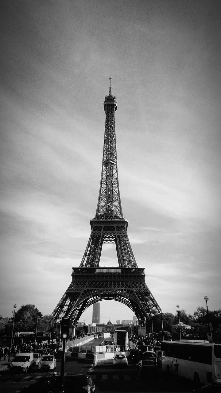 eiffel tower, architecture, built structure, metal, sky, famous place, international landmark, tower, culture, travel destinations, capital cities, tall - high, tourism, travel, transportation, city, metallic, history, building exterior, architectural feature