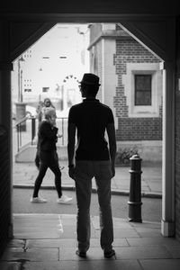 Woman standing in city